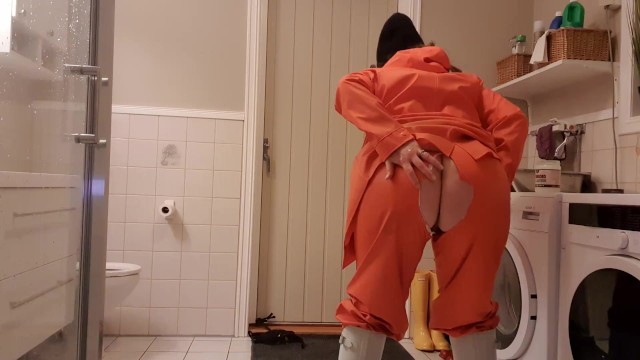 Having Fun with oil and rainwear gets ready for sex