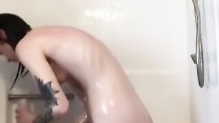 Skinny bimbos takes a shower and has a little fun with showerhead