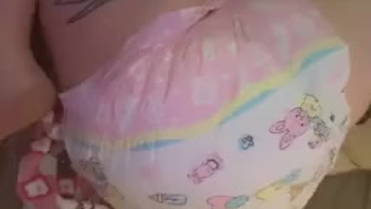Concealed diaper women fills diaper and has screaming orgasm