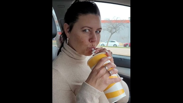 Pee inside a cup out by the vehicle