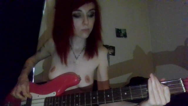 Turned On Red Haired Milf Plays Bass Nude with Beautiful Nipples