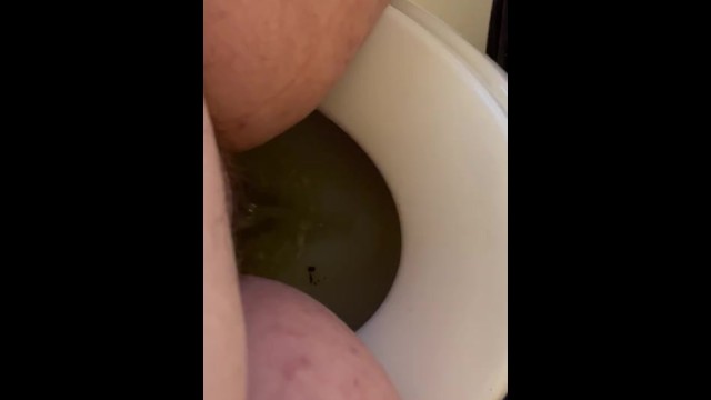 Short peeing into work restroom