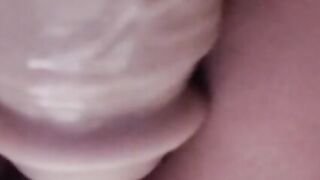 Milf fucks her cumming dildo upclose