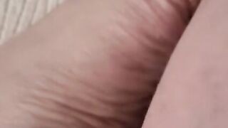 Taking video of my new red pedicure close up foot toe wiggle soles