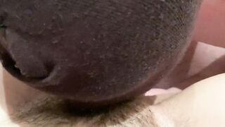 Licked hairy pussy close-up