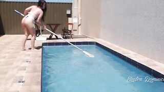 Very hot dark hair cleaning the pool